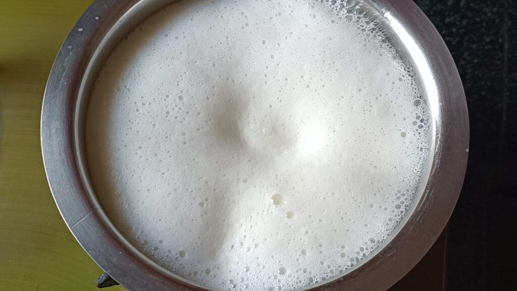 Cow milk is boiling in a container to make bengali rasgulla