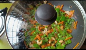 covering lid for vegetables boil and fry to make veg fried rice