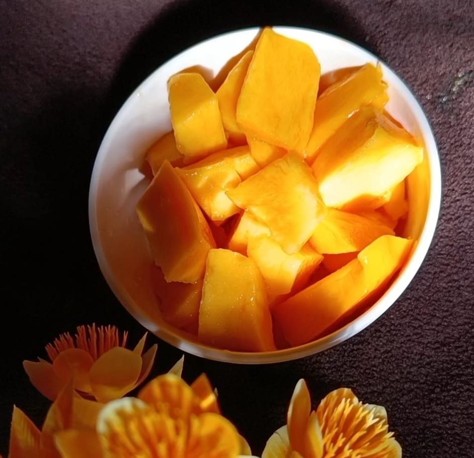 Mango cube are kept in a bowl to make mango chia pudding