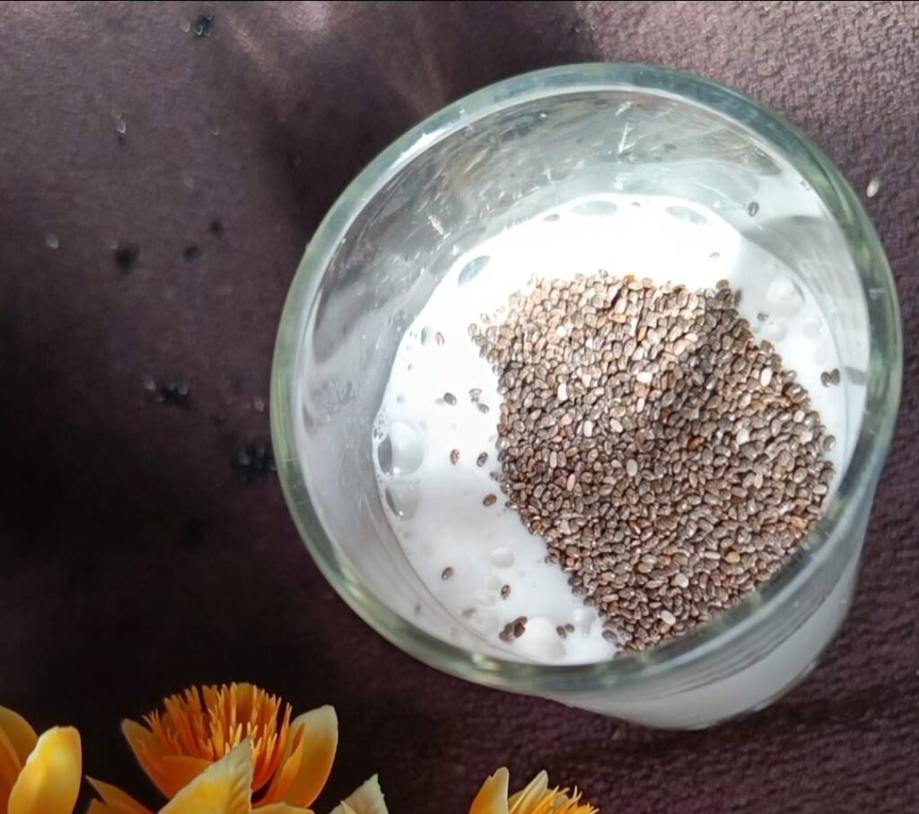 Adding chia seeds into almond milk to make oats smoothie for weight loss