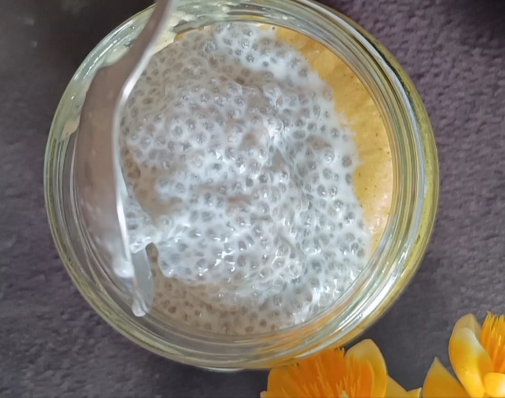 In a glass jar pour smoothie. Chia almond milk mixed with the smoothie to make mango oats smoothie for weight loss recipe