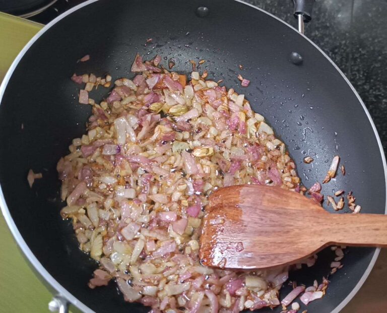 sauteing cumin seeds, green cardamom, cinnamon stick, onions with oil and ghee for matar mushroom ki sabji