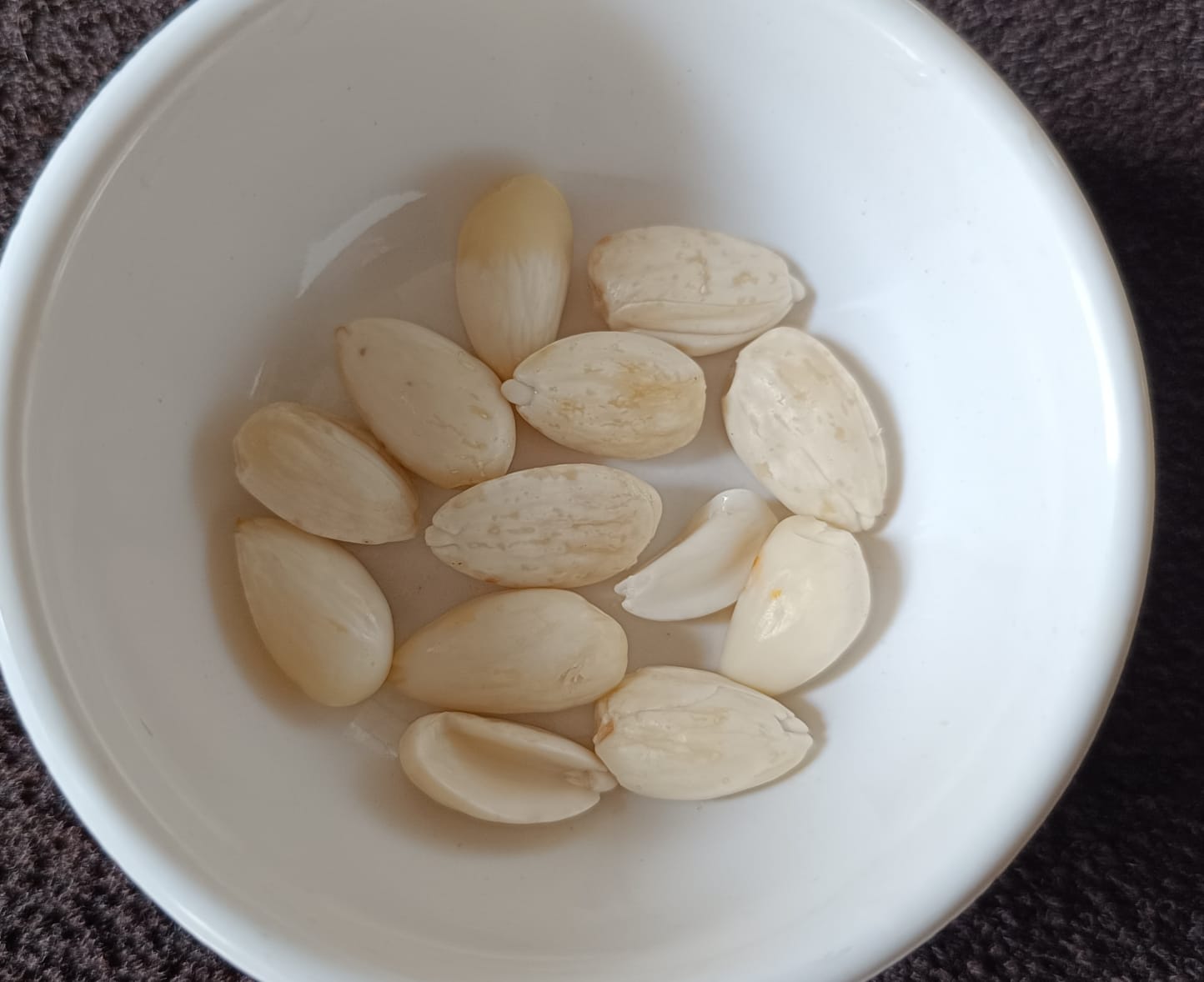 Peeped almonds kept in a bowl for mango chia seed pudding recipe