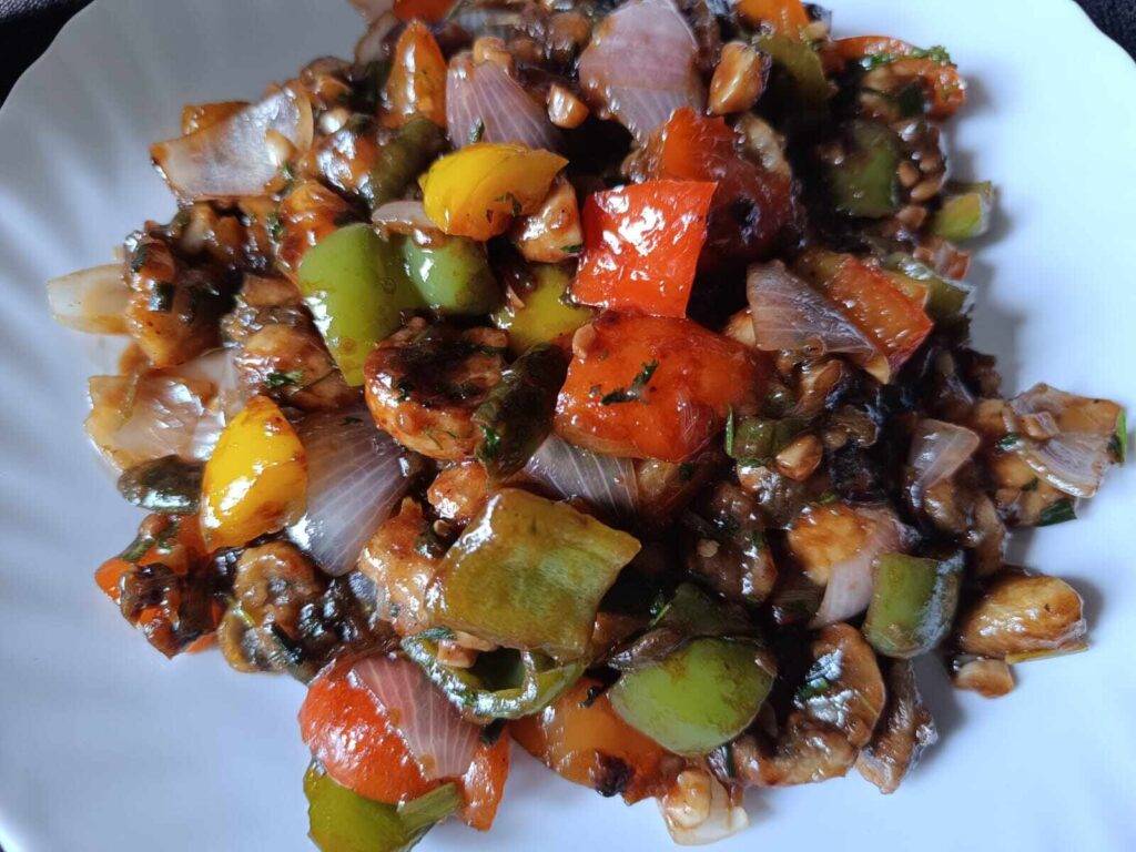 Chilli mushroom recipe served on a plate